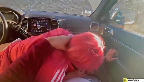 Asian woman in the car is giving a deepthroat to a big dick