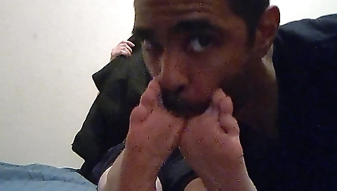 A blonde is getting fucked on her feet in the foot fetish video