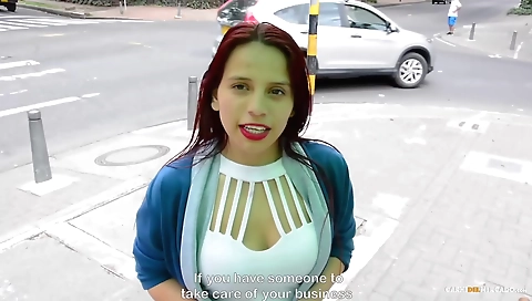 Red-haired babe riding a cock in an amateur porn video