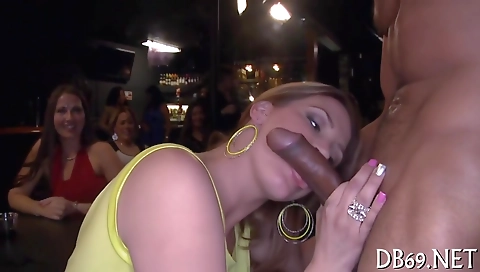 Busty brunette gets her lips deep sucked in a group of men