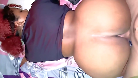 Amateur redhead enjoying a thick cock in doggy style