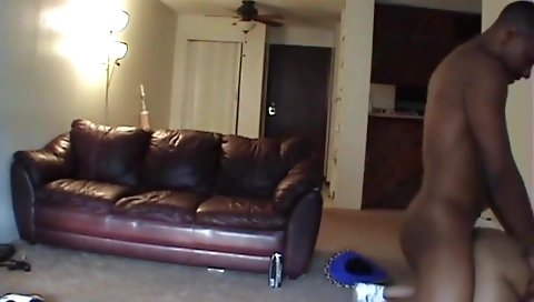 Amateur brunette in a webcam video sucking his cock