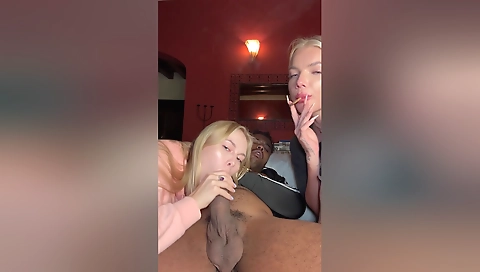 Blonde amateur is smoking a cigar and giving a blowjob