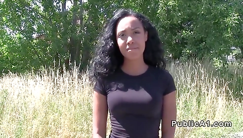 Ebony beauty with a big cock is flashing her big ass