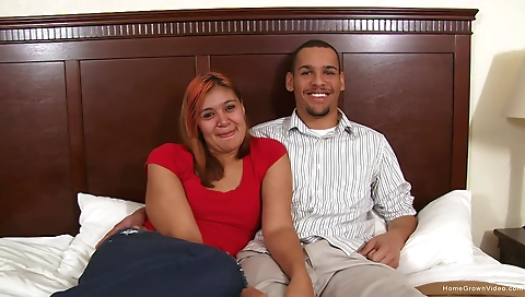 Ebony girl with a tattooed pussy swallows his big cock